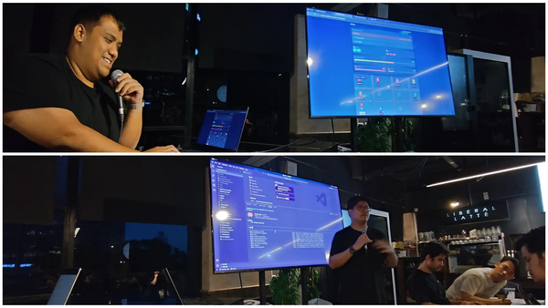 A speaker presenting on stage at a meetup in Kuala Lumpur, demonstrating Claude code on multiple screens. Event at Liberal Latte cafe.